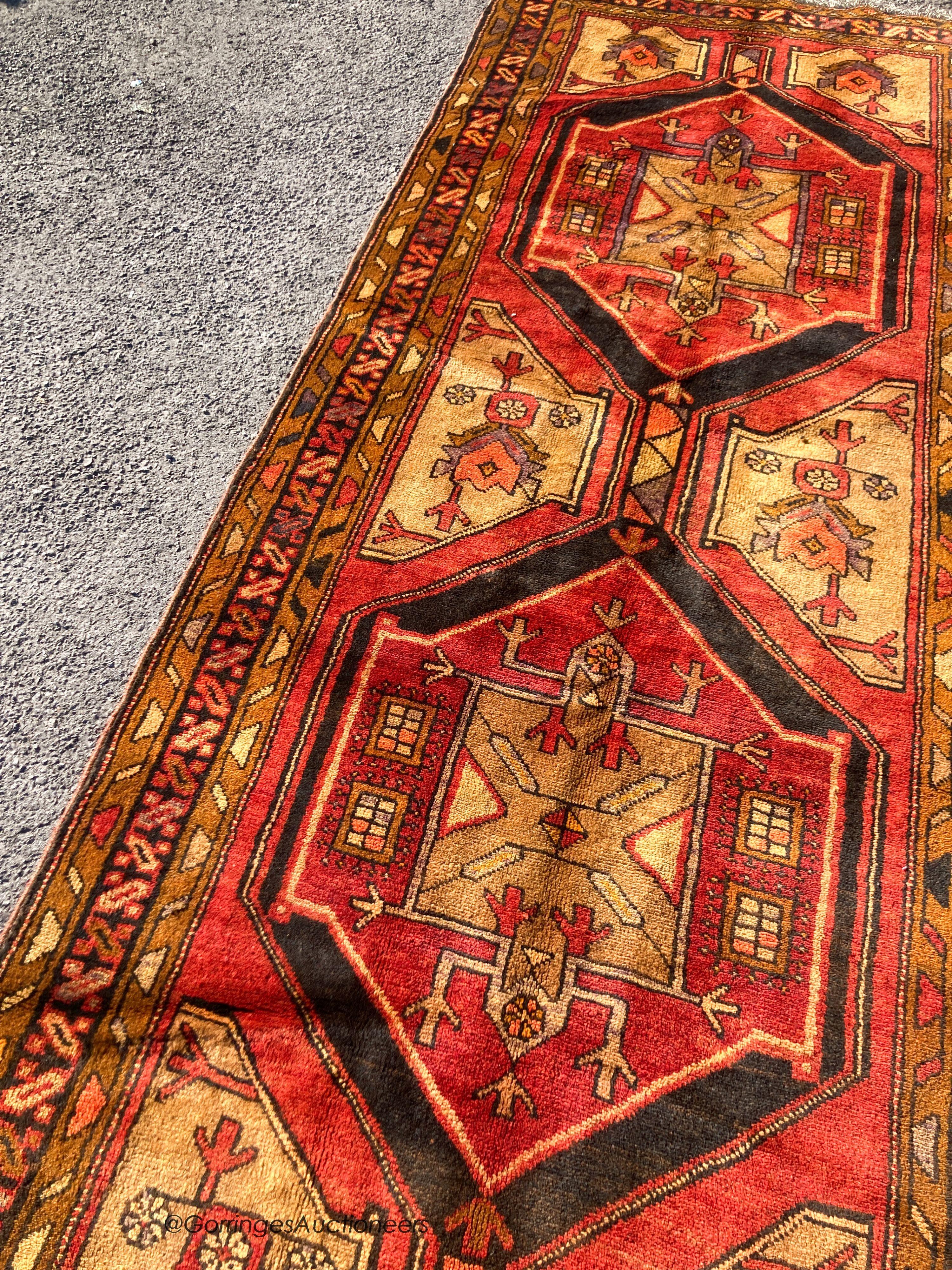 An Azarbijan rug, 400 x 110cm